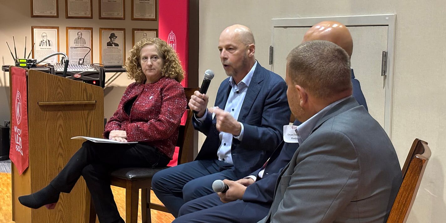 Speakers answering questions at the event in Oshkosh, WI