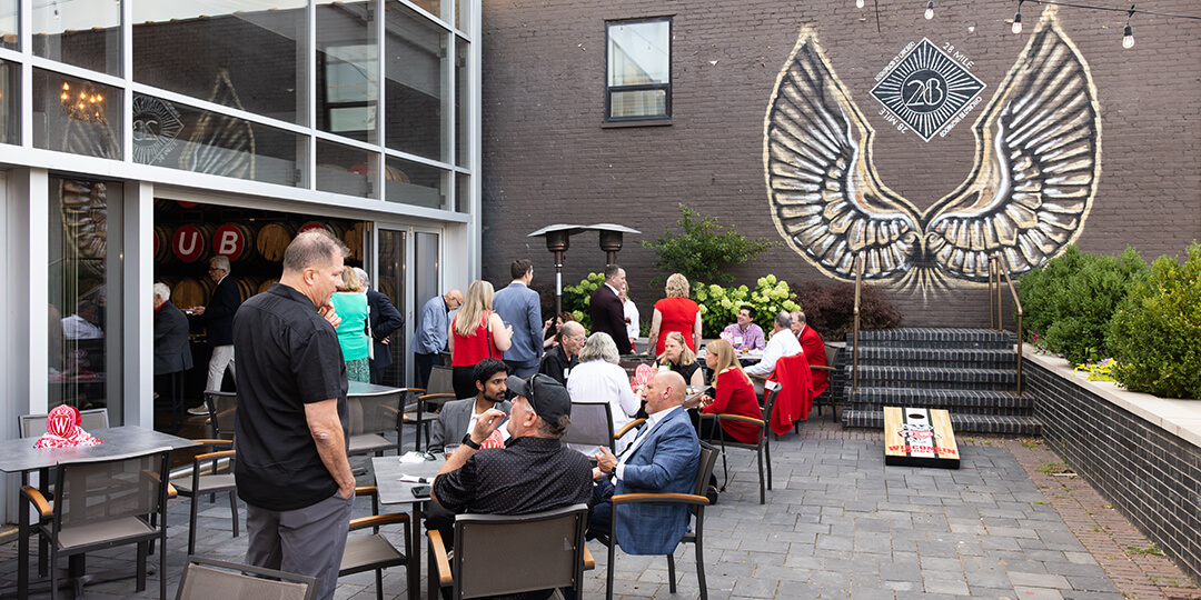 Alumni gather at 28 Mile Distilling Company to socialize and support important UW causes.