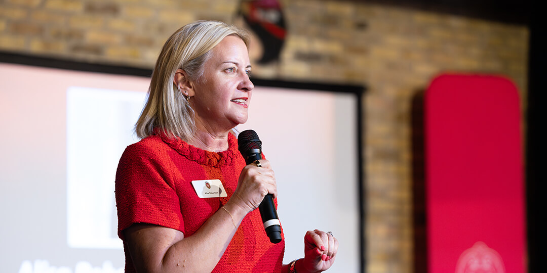 Alisa Robertson, CEO of the Wisconsin Foundation and Alumni Association, addresses guests.