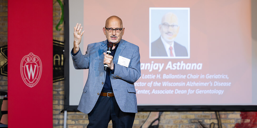 Dr. Sanjay Asthana, founding director of the Wisconsin Alzheimer’s Disease Research Center, addresses guests.